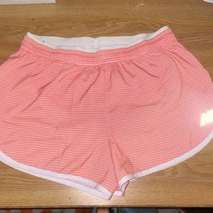 SM pink and orange striped new balance running shorts